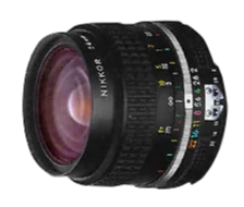 Black camera lens with purple-tinted glass element and distance scale markings